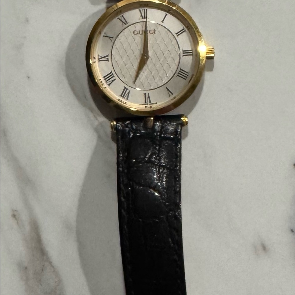 Gucci Gold Case Watch with Black Leather Strap